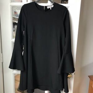 Black cocktail dress with bell sleeve detail